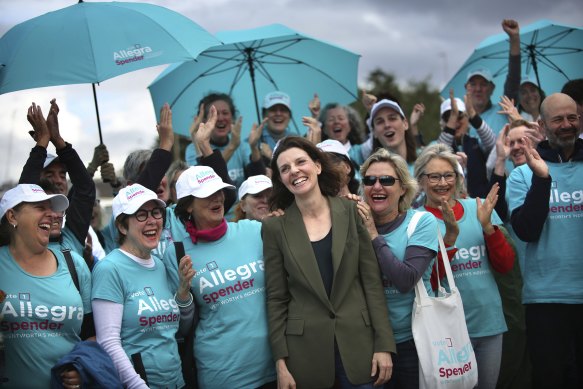 Allegra Spender celebrates her election win with supporters at Bondi Beach on Sunday.