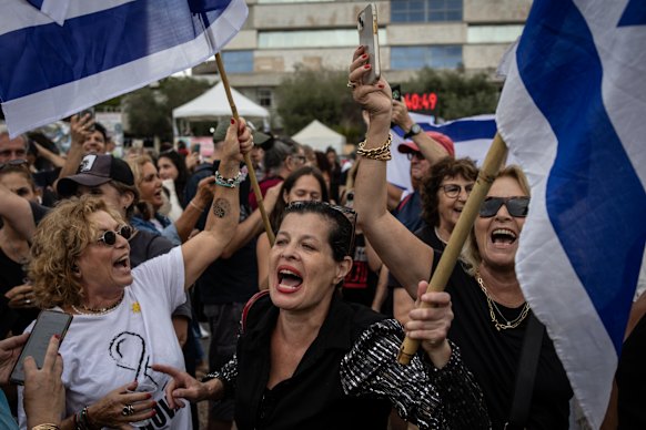 Israelis celebrate in Tel Aviv after the announcement of a peace deal. 