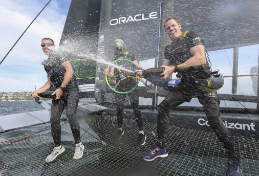 Team Australia celebrate their success on Sydney Harbour on Saturday.