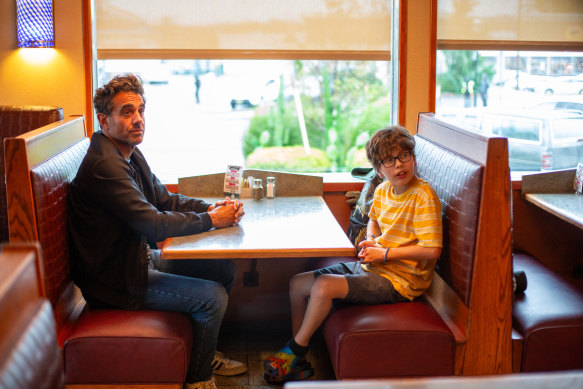 Max (Bobby Cannavale) takes Ezra, played by William Fitzgerald, on a road trip.