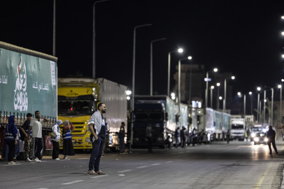 Aid convoy trucks loaded with supplies wait for the opening of the Gaza-Egypt border are seen at Arish City on Sunday morning in North Sinai, Egypt. 
The aid convoy, organised by a group of Egyptian NGOs, set off today from Cairo for the Gaza-Egypt border crossing at Rafah.