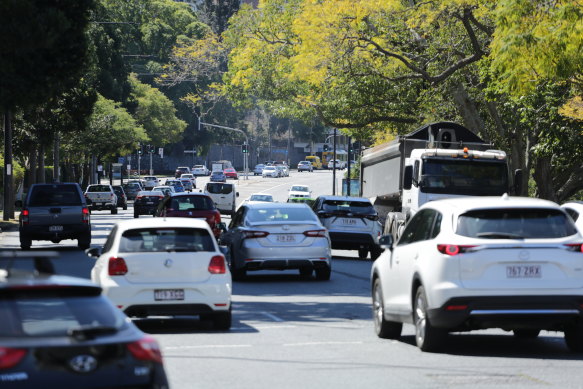 One lane of car traffic on Coronation Drive would switch to a dedicated bus-only lane, if the Greens win the Brisbane City Council election on March 16. 