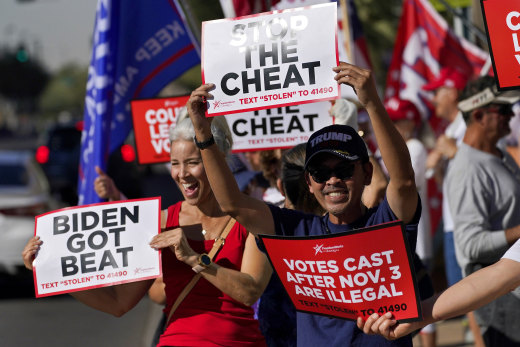 Dozens of pro-Trump protesters gathered to protest in Phoenix after Democratic challenger Joe Biden was reported to have flipped the Republican stronghold of Arizona.