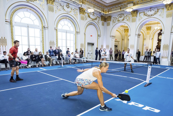 Players from Major League Pickleball demonstrate the game in the New York Stock Exchange boardroom to promote the start of last season.