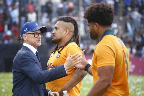 Les Kiss congratulates Brandon Paenga-Amosa and Rob Valetini following the win over Argentina.