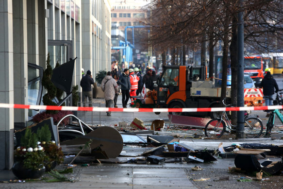 Emergency workers respond after a huge aquarium in Berlin explodes.