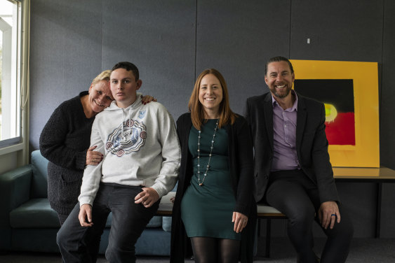 Lesley Deegan with her son, Joshua, social worker Alyssa Cassidy and Coreen School principal Tim Gardner.