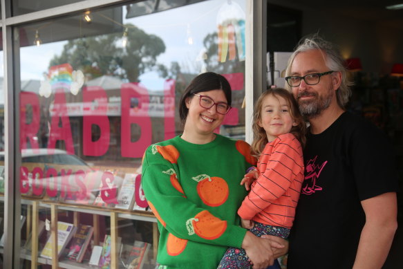 Natalie Latter and Sam Baker with their daughter Pip. 