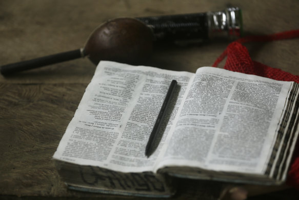A bible inside the improvised temple where a pregnant woman, five of her children and a neighbour were killed in a religious ritual.