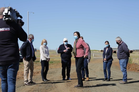 Queensland Premier Annastacia Palaszczuk (centre) inspects the site for the quarantine facility.