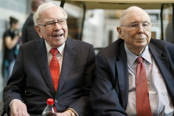 Warren Buffett and business partner Charlie Munger (right).