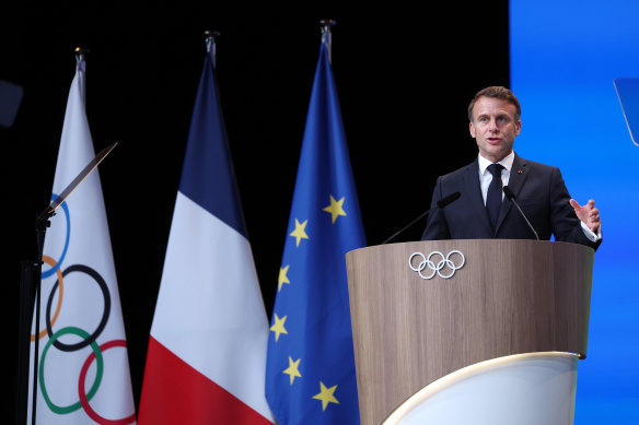 French President Emmanuel Macron addresses the IOC Session in Paris.