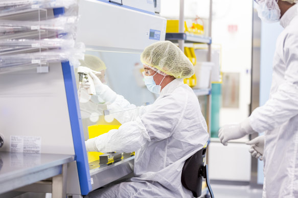 Moderna biotech workers in the company’s mRNA lab in Norwood, greater Boston.
