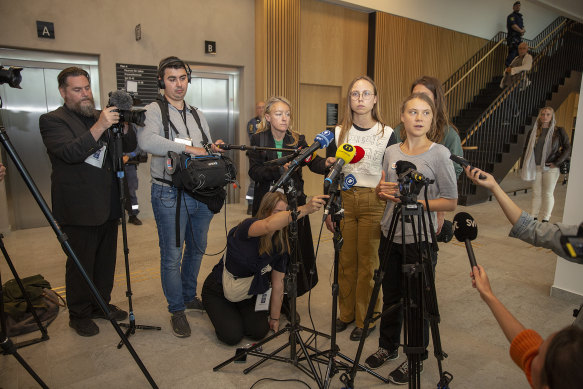 She refuses to play by the rules: Greta Thunberg speaks to the media after appearing in court.