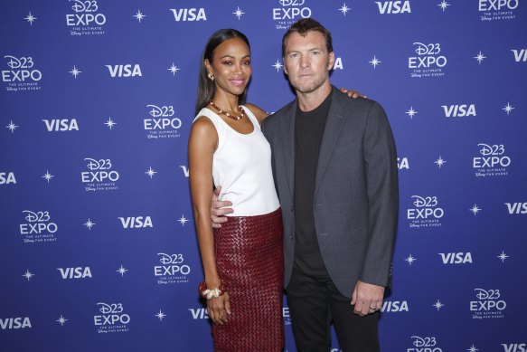 Zoe Saldana and Australian actor Sam Worthington from Avatar ar D23 Expo in Anaheim, California.