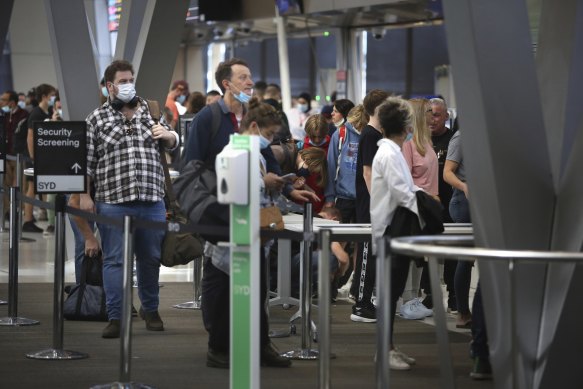 Passengers queue at the domestic terminals on Saturday.