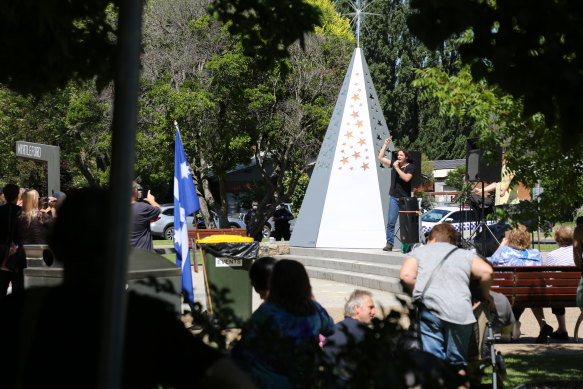 A demonstrator addresses the crowd.