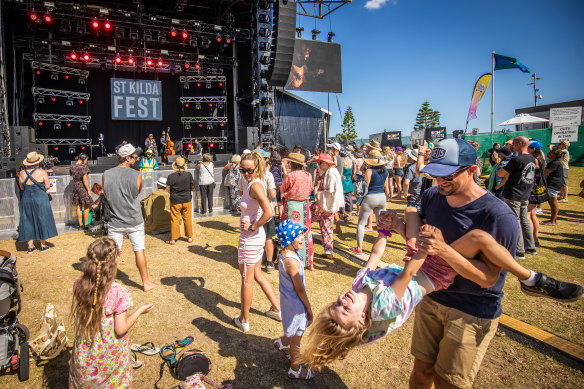 Melburnians soak in the sun at St Kilda festival last year.