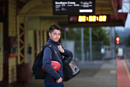 Long way to go: Shane Clough at Gisborne station early in his almost two-hour journey to school.