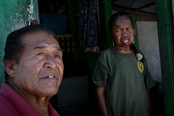 Swinley Freddy (left) moved to Rongelap in 1970 to be with his wife. He believes his daughter Julie (right), now 48, was affected by radiation.