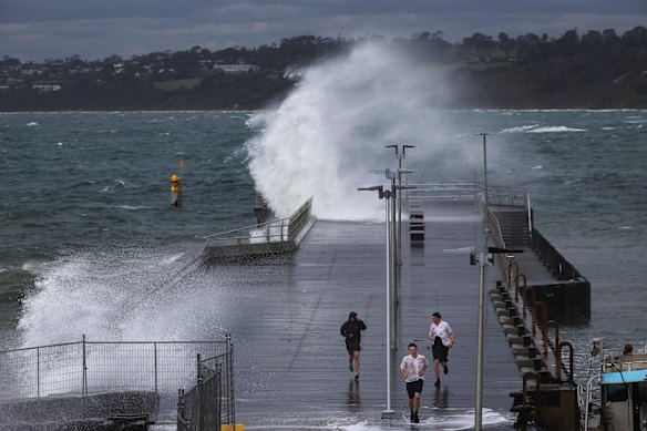 Wild weather lashed the Mornington Pier earlier this week. Now a man has gone missing about one kilometre offshore after the boat he was on capsized on Friday night.