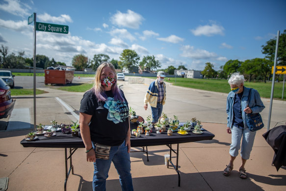 "I’ve never been a Democrat but the older I get the more I’m going that way": Cyndee Rivera selling cactus teapots in Macomb County, Michigan.