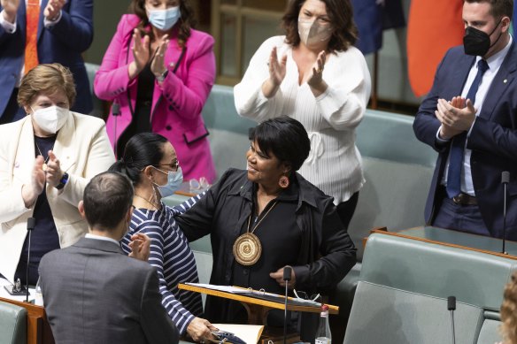 Member for Lingiari Marion Scrymgour, is congratulated by Minister for Indigenous Australians Linda Burney after delivering her first speech in the House of Representatives at Parliament House in Canberra on Wednesday 27 July 2022. 