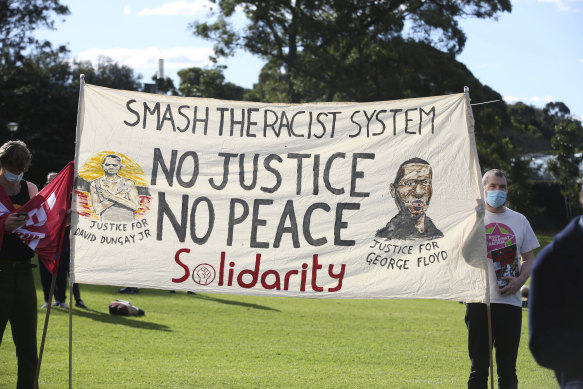 A banner at the Black Lives Matter rally in The Domain.