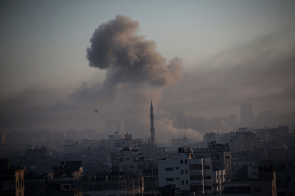 Smoke rises after Israeli strikes on Gaza City on Friday.