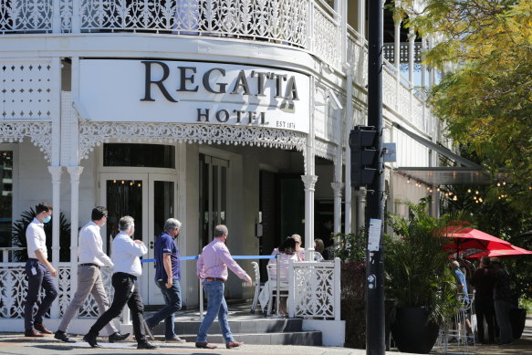 Venues like Toowong’s Regatta Hotel will be able to welcome more patrons and allow them to eat and drink while standing again as COVID-19 restrictions ease further.