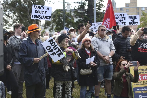 Local residents attend a rally in Randwick to oppose plans by the state government to cut bus routes.
