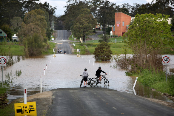 Flood water cuts off the road on Wolseley Rd, McGraths Hill after heavy rain.