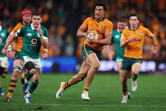 Joseph Suaalii on the charge for the Wallabies.