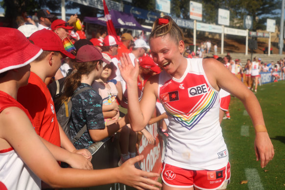 Lisa Steane of the Swans with fans.