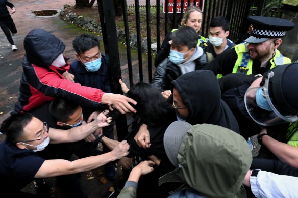 Hong Kong protestor Bob says he was dragged onto consulate grounds and attacked after staff took offence to a poster of President Xi Jinping.