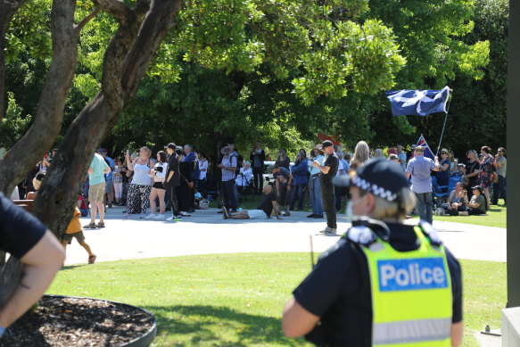 Demonstrators listen to speeches.