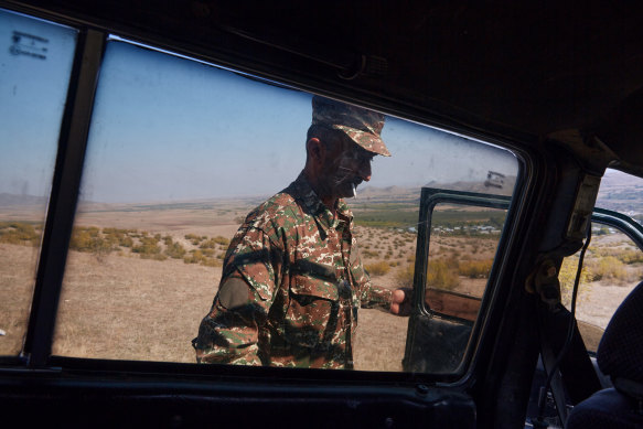 A soldier steps into his car on the outskirts of Askeran, Nagorno-Karabakh, Although Armenia lost part of the town of Hadrut to Azeri forces this week, the people of Nagorno-Karabakh continue to fight for autonomy over the contested territory.