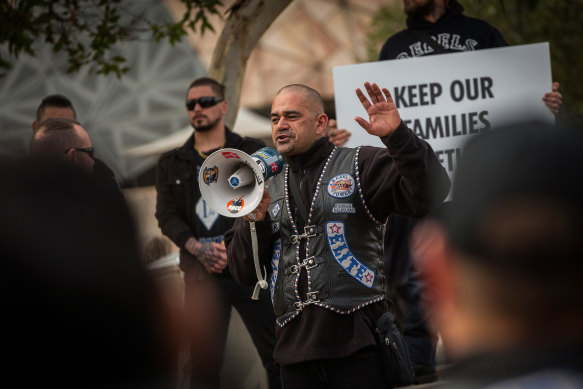 Former Rebels bikie club president Dean Martin speaks at a rally.