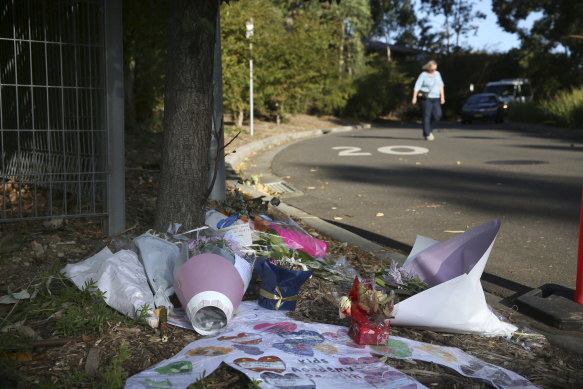 Flowers and tributes outside the Newmarch Aged Care Village.