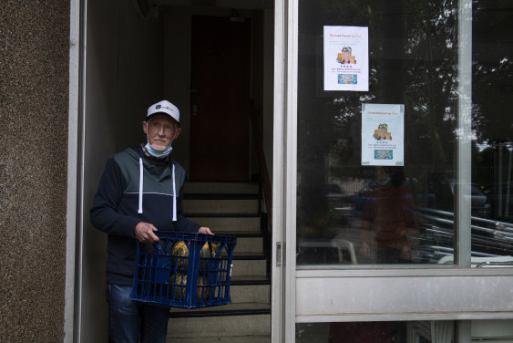 Philip Grandfield, 73, says meeting residents of other buildings while volunteering during the COVID-19 pandemic has been "an eye-opener".