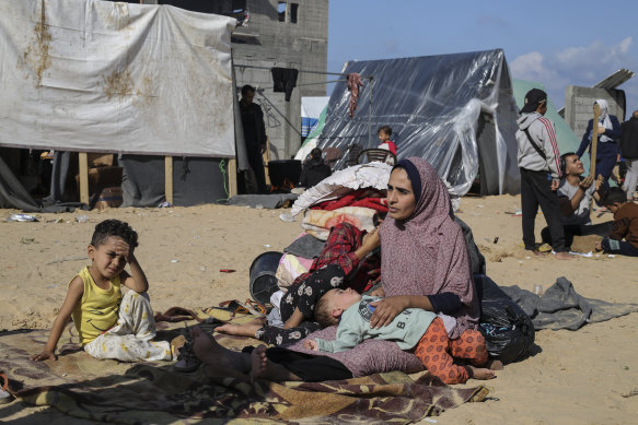 Palestinians displaced by the Israeli bombardment of the Gaza Strip set up a tent camp in Rafah on the southern border with Egypt.