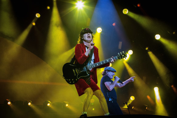 Angus Young on stage in Sydney with singer Brian Johnson, at the start of the band's Rock or Bust tour in 2015.