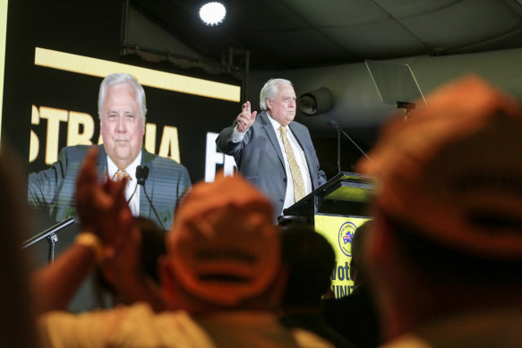 Clive Palmer addresses the 1000-strong crowd at his long-shuttered Coolum golf resort. 