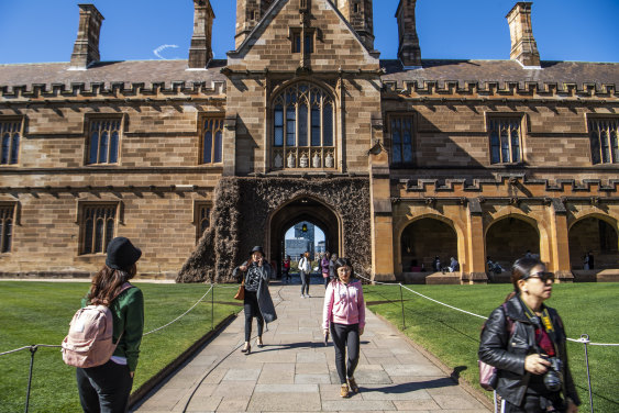 Students at the quadrangle building at the University of Sydney.