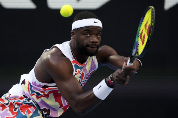 Frances Tiafoe plays a backhand.