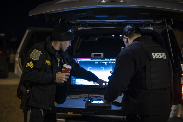 Officers operate a drone while surveilling for other drone activity in Seaside Heights, New Jersey, this month.