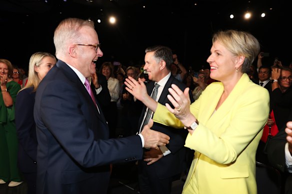 Albanese goes for the shake while Plibersek goes for a hug at Labor’s campaign launch on Sunday.