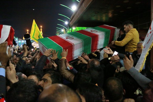 Mourners carry the coffin of Iran's top general Qassem Soleimani during his funeral in Karbala, Iraq.