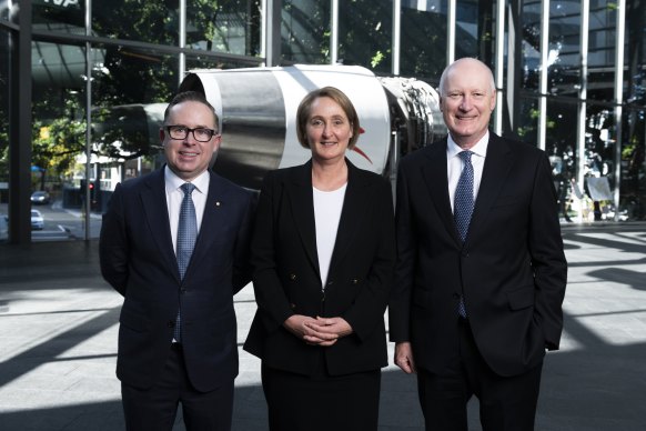 Qantas chair Richard Goyder (right) announced on Tuesday that Vanessa Hudson (centre) would take over from CEO Alan Joyce (left).