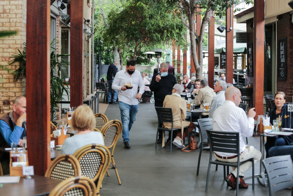 The lunch crowd at Brisbane’s Breakfast Creek Hotel. Since December 17 last year, such venues have required all patrons and staff to be fully vaccinated.